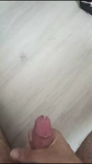 A guy masturbates and ejaculates in his room without the presence of his girlfriend