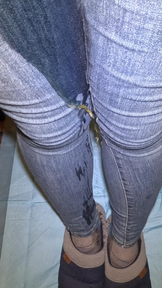 Multi-layered river of myself flows directly down my right leg into my slipper thumbnail