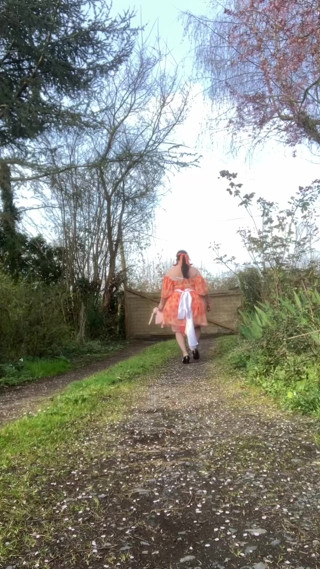 In babydoll outfit with an orange dress for a day