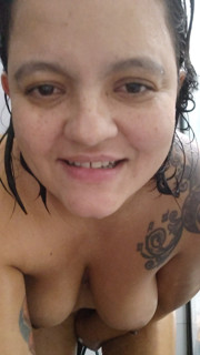 Alone at home she masturbates in the shower