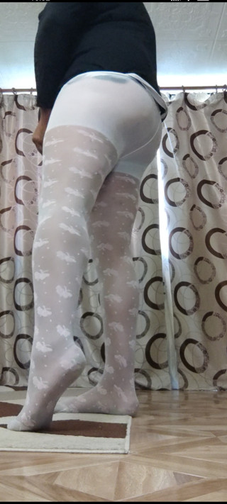 Feeling hot in white pantyhose thumbnail