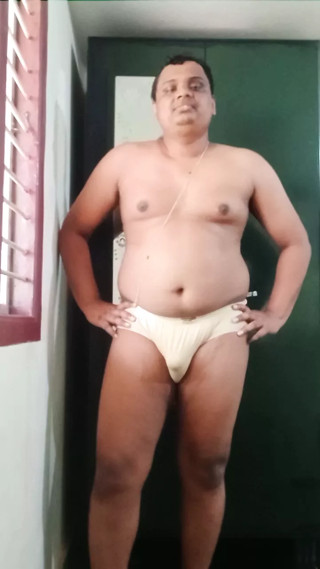 Indian guy removing clothes confidently and becoming completely nude