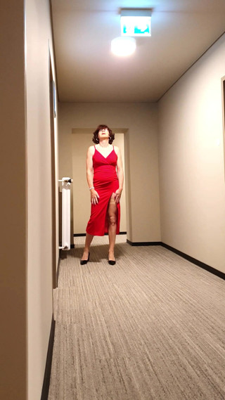 Sexy erotic and frivolous in red dress thumbnail