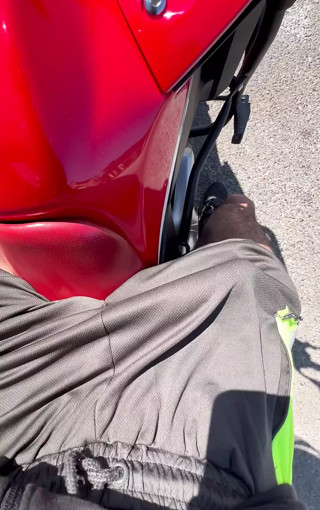 Big dick 23cm soft in shorts without underwear taking a motorcycle ride on the street