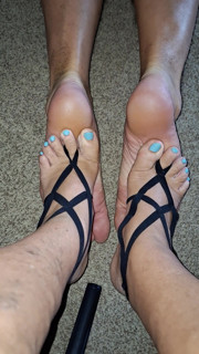 My girlfriend massages the soles of my feet with her soft  feet