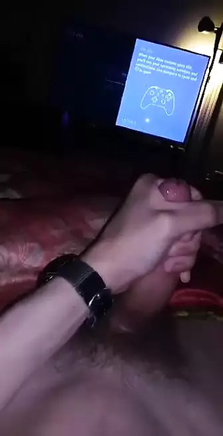 Gay guy slowly strokes his dick until he busts a nut.