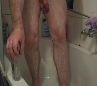 Young man in the shower
