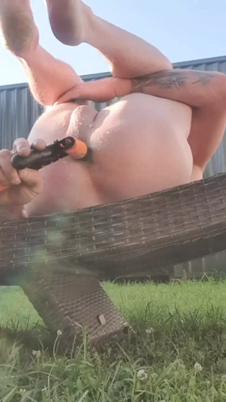 Using a garden hose to wash my ass outside hopefully someone will catch me