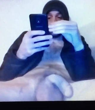 Straight hot bearded guy sitting with his huge flaccid cock