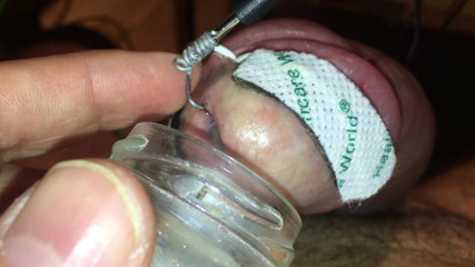 Extracting semen from heavily electro tortured cock