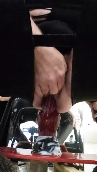 enjoying a dildo