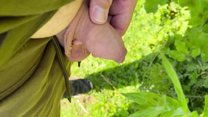 Skin pulled back having a piss