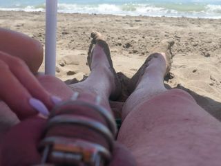 teasing in chastity on the beach