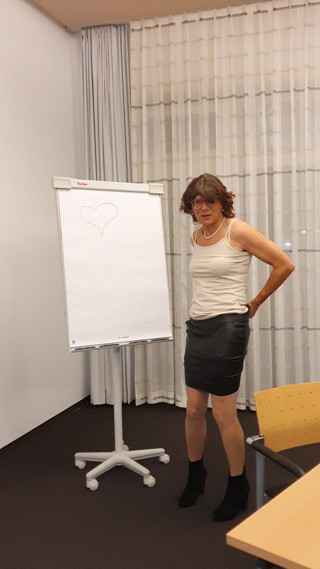Teacher in nude in suspenders and without miniskirt