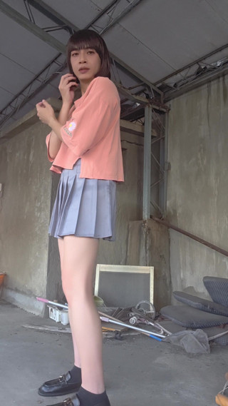 A Pleated Skirt Paired with White Underwear, and an Anal Plug Inserted on the Terrace thumbnail
