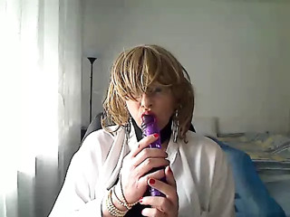 horny MILFhorny MILF tranny in front of webcam simulates a Blowjob while playing with a vibrator in her mouth thumbnail