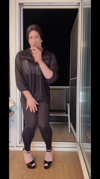 Sissy teasing and dildo riding on balcony thumbnail