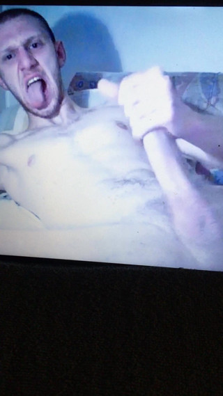 Straight skinhead lad wanking and jerking his huge cock