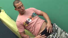 Latino boy strokes his pecker