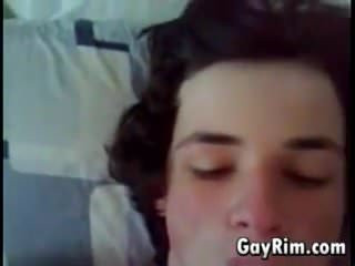 young guy tastes the cum