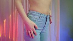 Redhead Striptease Out of Skinny Jeans