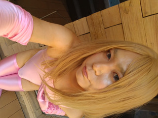 A blonde cross-dresser in a pink costume got and masturbated! thumbnail