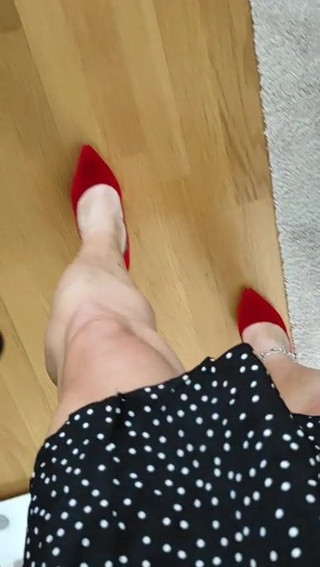Joana V0mit walking in bedroom with hot red heels