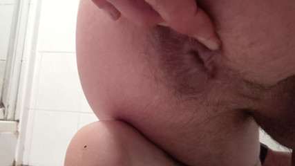 Inserting candy into the anus