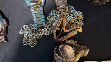 three rose gold MK wristwatches.