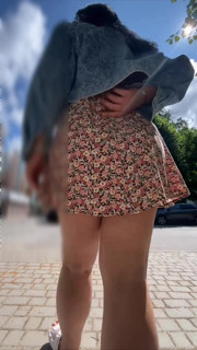 Milf walks around the store without panties