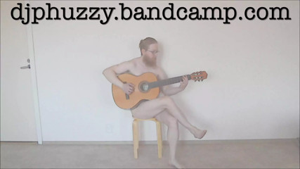 DJ Phuzzy plays guitar naked