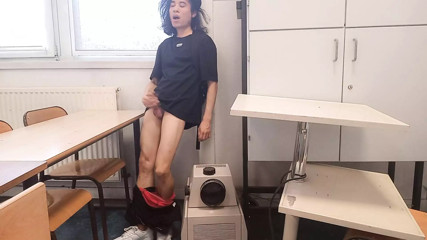 Cum at school, this horny student twink wanks his smooth cock and squirts jizz riskyly at school in a classroom on classmate des