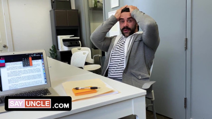 Two muscular coworkers are stuck in the office during lockdown and find a distraction from boredom