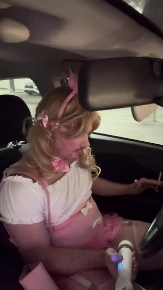 Sissy snow bunny uses vibrator on caged clitty thumbnail