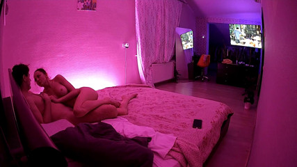 Kamila and Danildo cuddling in bed