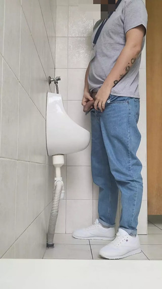 Risky jerk in public urinal at work