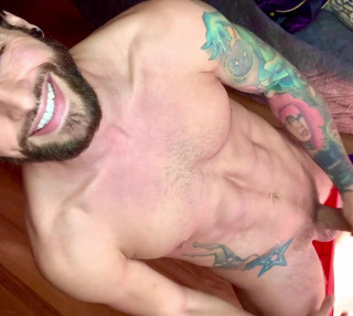 Eddie Danger jacks off his hard cock and lifts weights