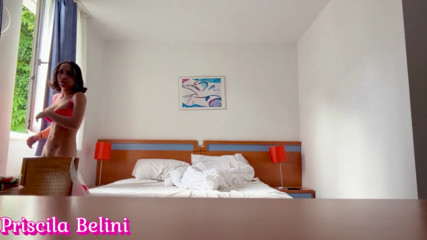 Woman Being Recorded in Hotel Room
