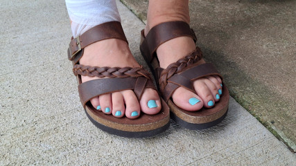 Rocking On Her Swing Ignoring Me And Playing With Her Leather Sandals