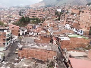 friend invites me to her house in the Colombian favelas