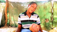 In village cherishing myself with potatoes