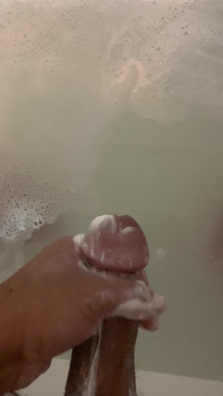 Stroking soapy cock