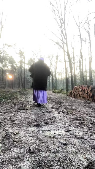 In bourgeois attire to go for a walk in the forest