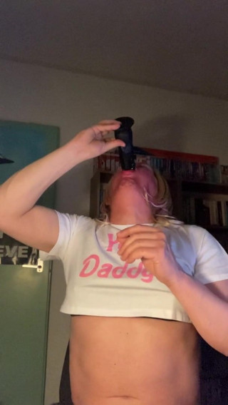 sucking a Big Black Dildo...