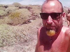 Couple Is Hiking Naked Near the Coast