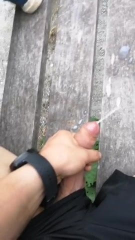 Outdoor cumshot on a bench