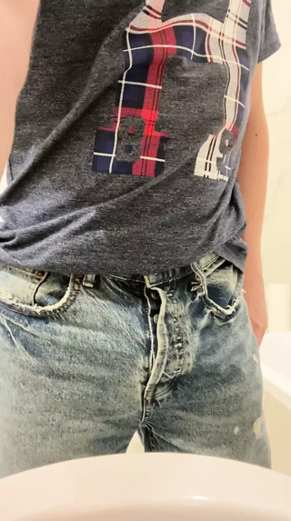 Romanian peeing in the bathroom at work