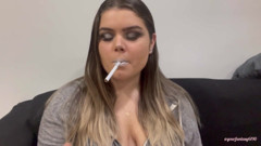 Circles of smoke with silver lipstick