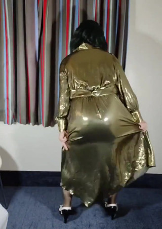 Hot crossdresser in erotic gold metallic gown thumbnail