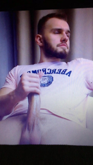 Handsome bearded hunk jerking his huge cock